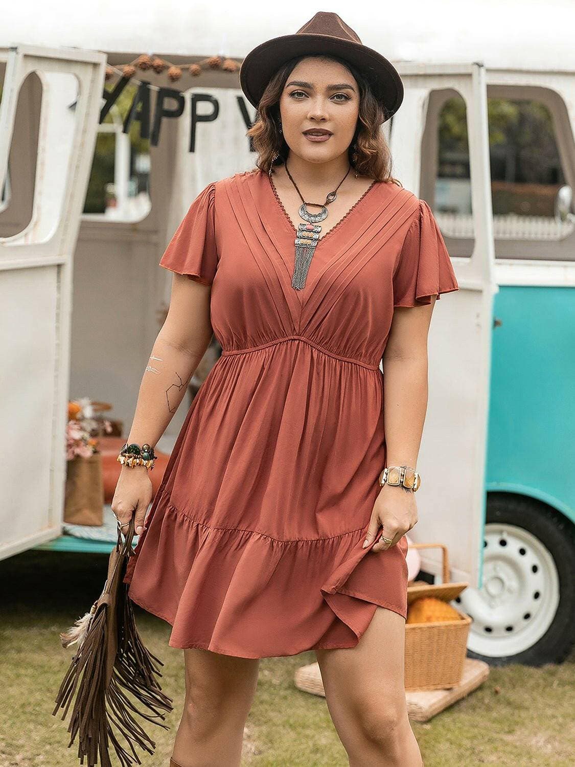 Ruffled V-Neck Plus Size Dress with Flirty HemFlaunt Your Style with Confidence
 Upgrade your wardrobe with our Ruffled V-Neck Plus Size Dress with Flirty Hem, a perfect blend of elegance and playfulness.
 
 MaiLove Salve Size Dressplus