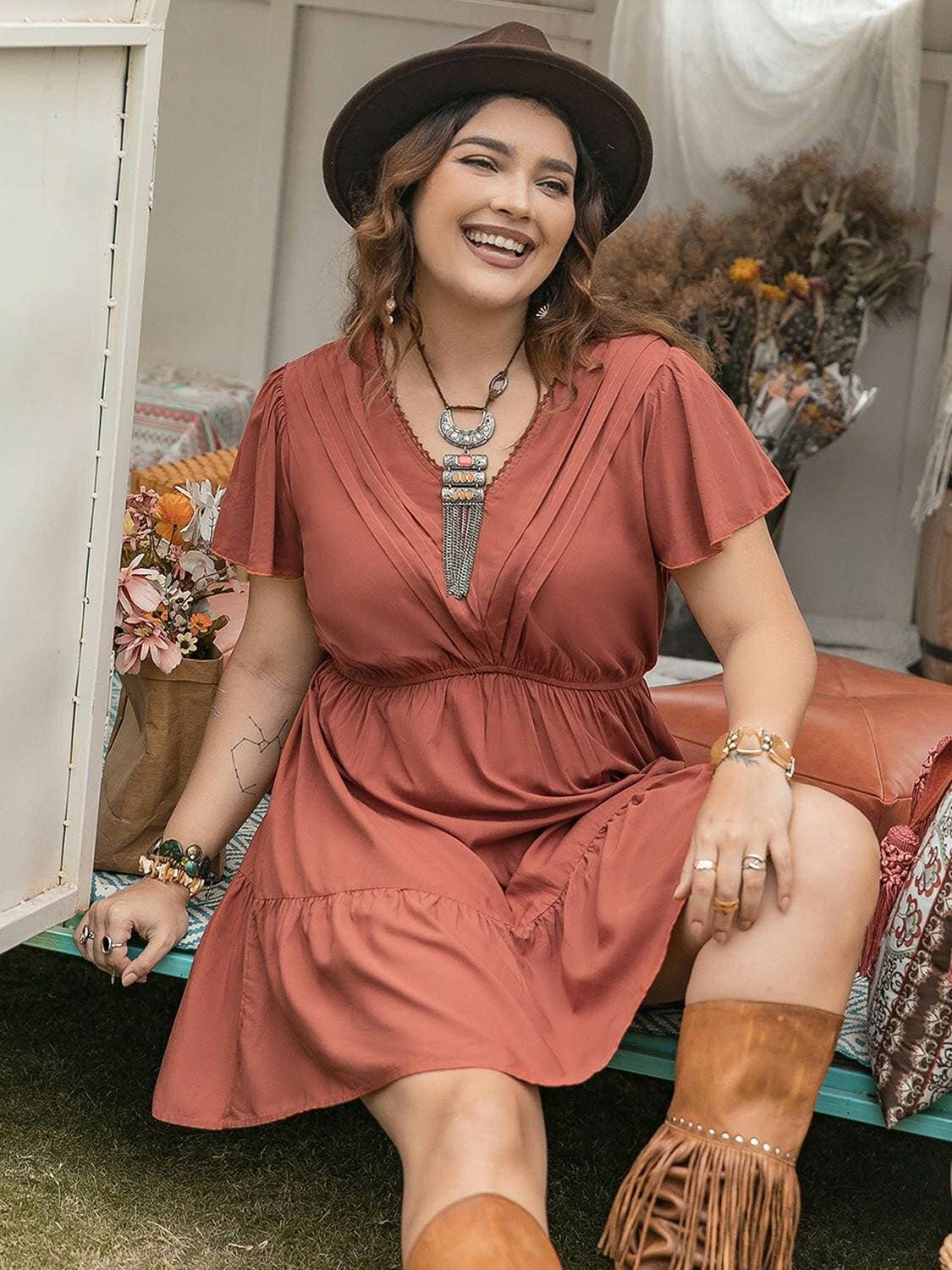 Ruffled V-Neck Plus Size Dress with Flirty HemFlaunt Your Style with Confidence
 Upgrade your wardrobe with our Ruffled V-Neck Plus Size Dress with Flirty Hem, a perfect blend of elegance and playfulness.
 
 MaiLove Salve Size Dressplus