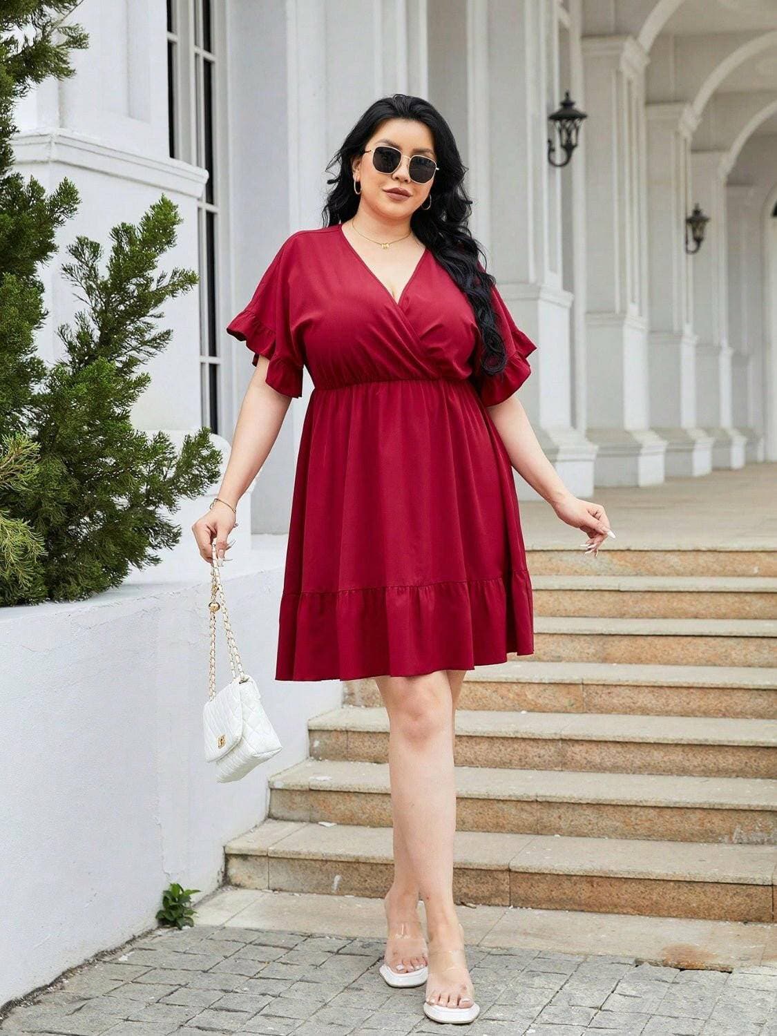 Flounce Sleeve Plus Size Sheath Dress with Ruched DetailExperience Elegance and Comfort in our Flounce Sleeve Plus Size Sheath Dress
 
 
Flattering Design: Embrace your curves with the ruched detail that accentuates your Love Salve Size Sheath Dressplus