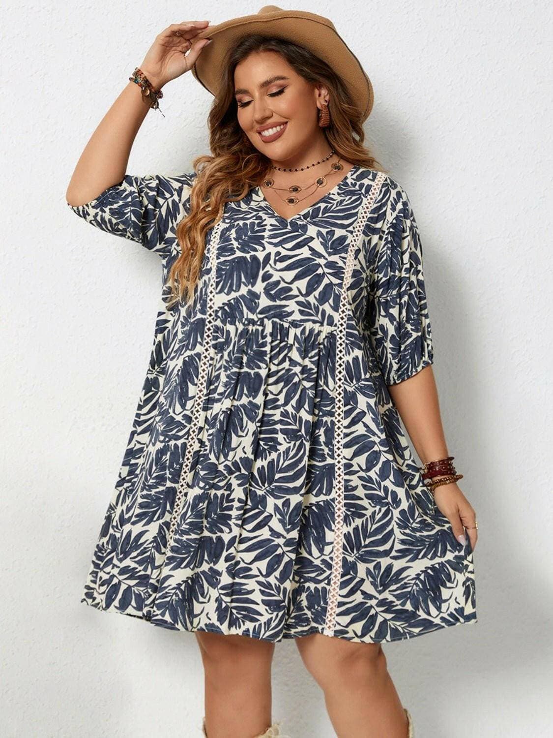 Plus Size Printed V-Neck Half Sleeve Mini DressPlus Size Printed V-Neck Half Sleeve Mini Dress
 Indulge in effortless style with our Plus Size Printed V-Neck Half Sleeve Mini Dress. Elevate your wardrobe with thiLove Salve -Neck Half Sleeve Mini Dressplus