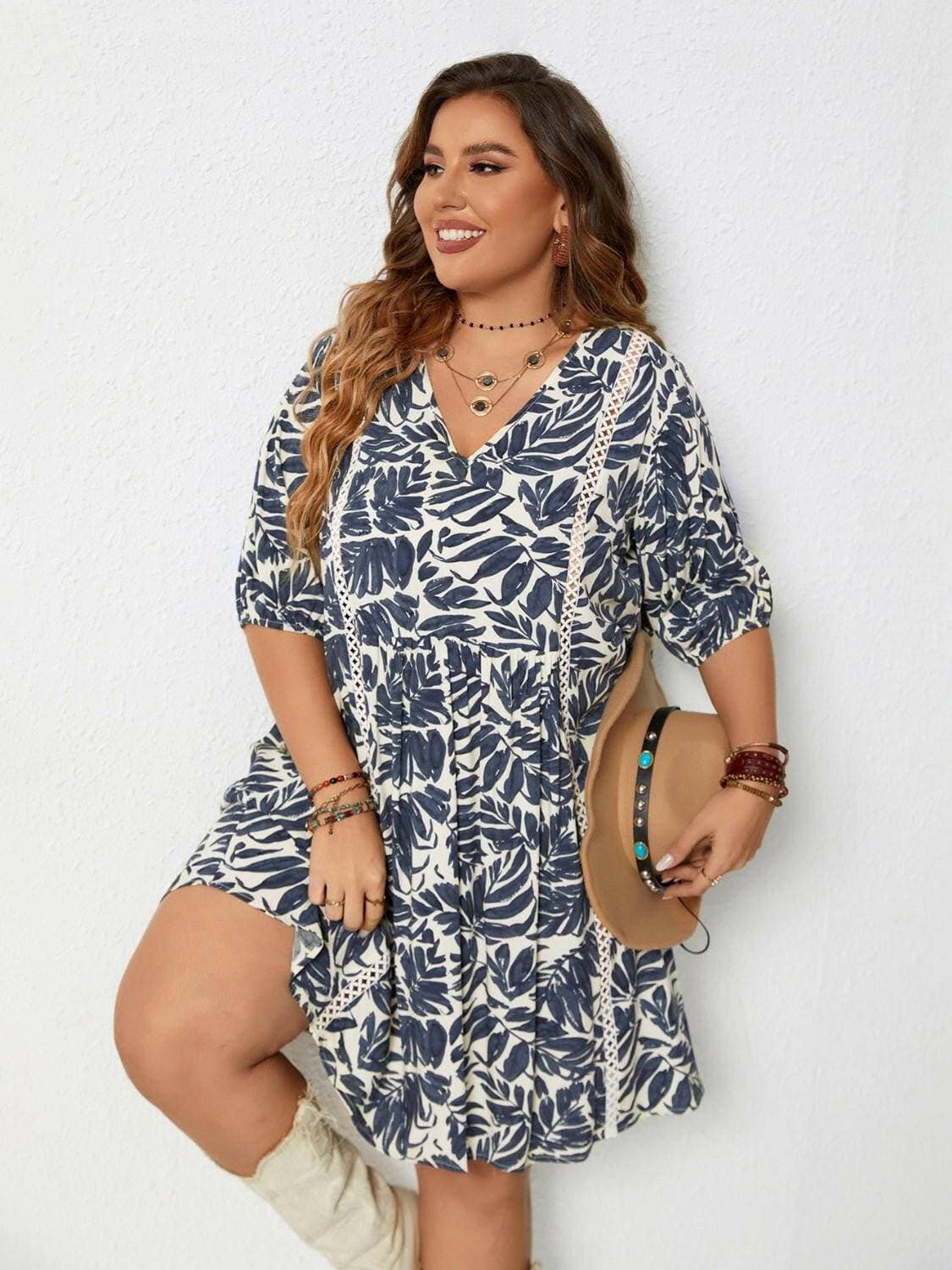 Plus Size Printed V-Neck Half Sleeve Mini DressPlus Size Printed V-Neck Half Sleeve Mini Dress
 Indulge in effortless style with our Plus Size Printed V-Neck Half Sleeve Mini Dress. Elevate your wardrobe with thiLove Salve -Neck Half Sleeve Mini Dressplus