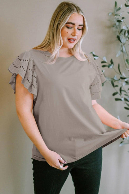 Elegant eyelet blouse for plus size women with short sleeves