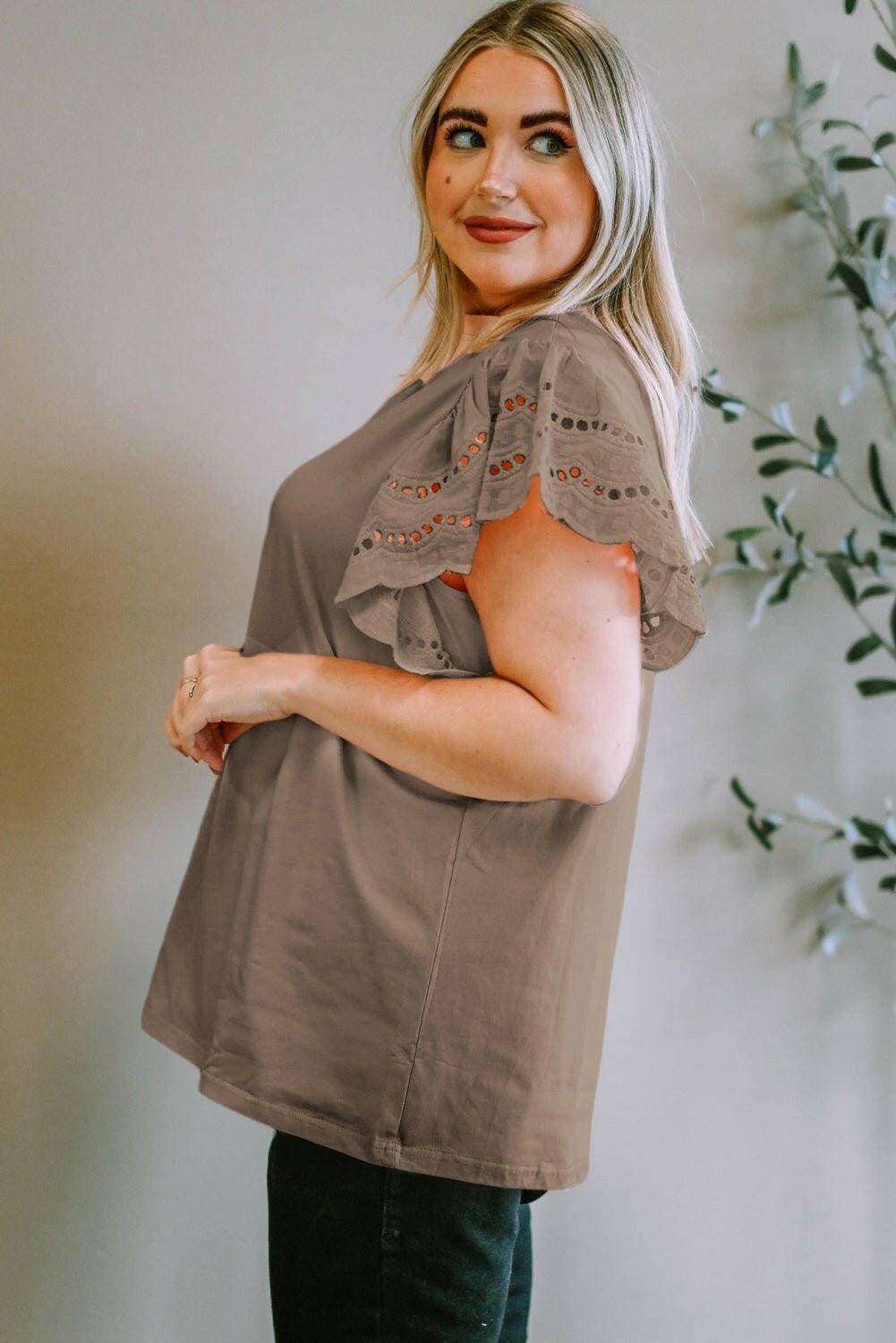 Elegant eyelet blouse for plus size women with short sleeves