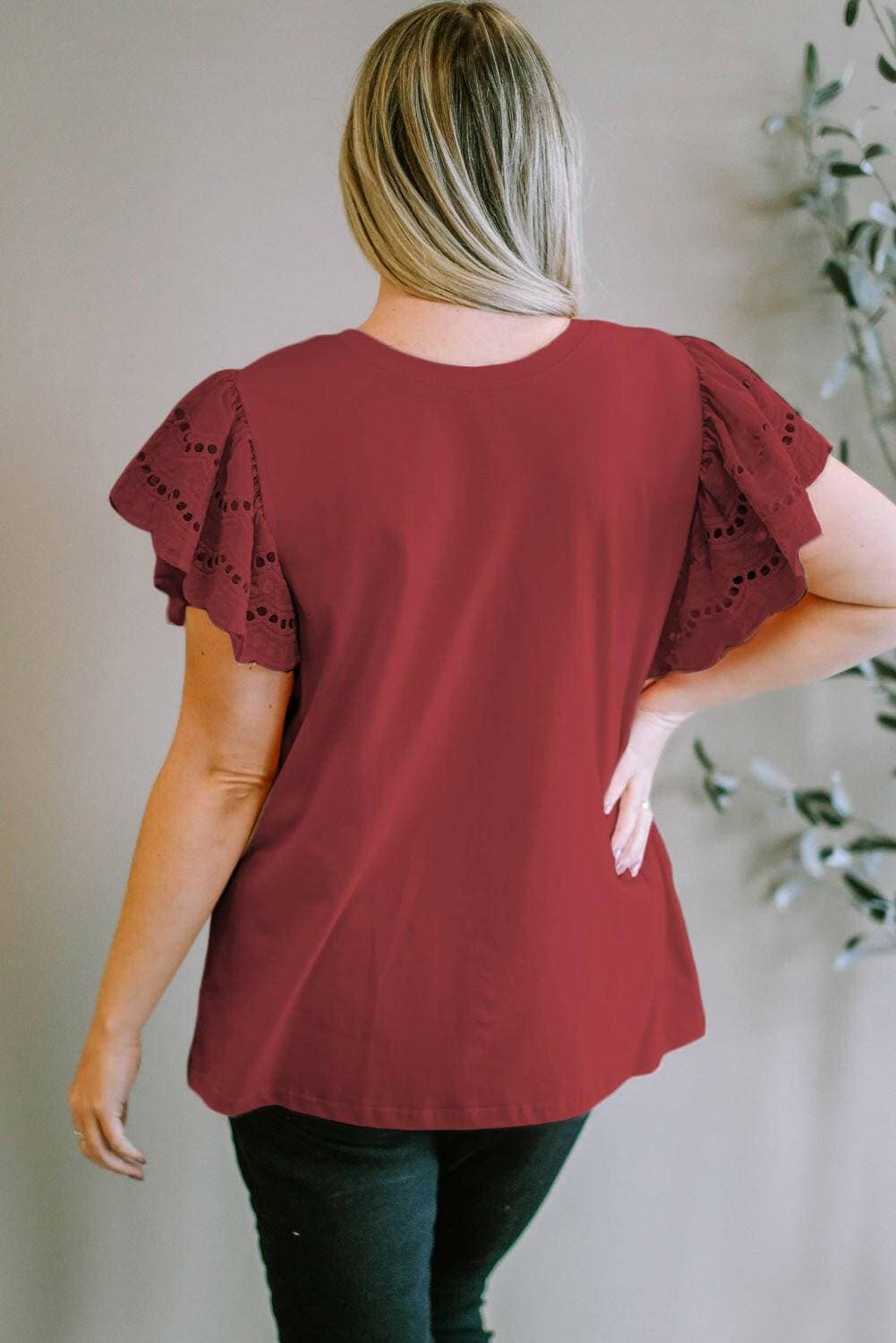 Elegant eyelet blouse for plus size women with short sleeves