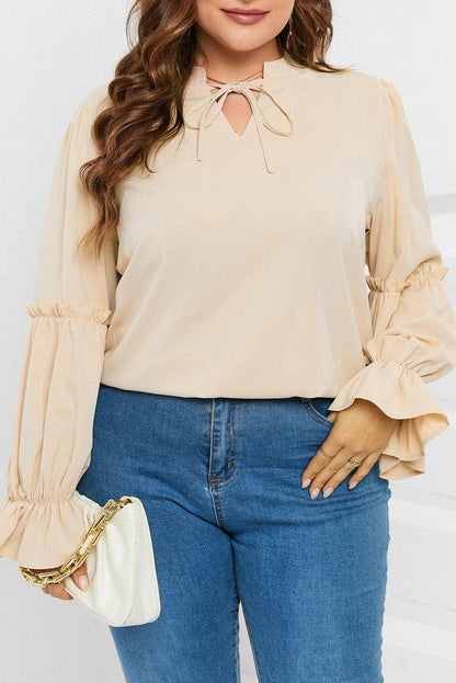 Ruffled Tie Neck Plus Size Flounce Sleeve Sheer BlouseRuffled Tie Neck Plus Size Flounce Sleeve Sheer Blouse
 Upgrade your style with our elegant Ruffled Tie Neck Plus Size Flounce Sleeve Sheer Blouse. Elevate your lookLove Salve Size Flounce Sleeve Sheer Blouseplus