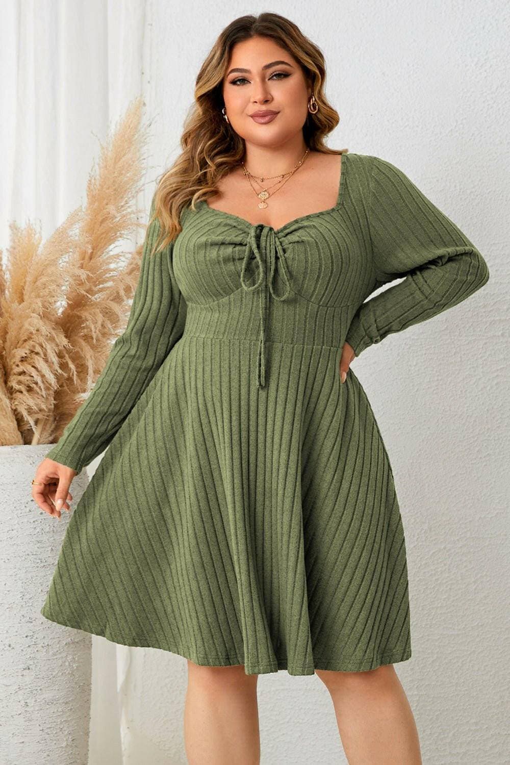 Curve Embracing Sweetheart Neckline Ribbed Dress with Long SleevesEnhance Your Curves with Style
 Step into sophistication with our Curve Embracing Sweetheart Neckline Ribbed Dress. This dress is designed to hug your curves in all Love Salve Curve Embracing Sweetheart Neckline Ribbed Dressplus