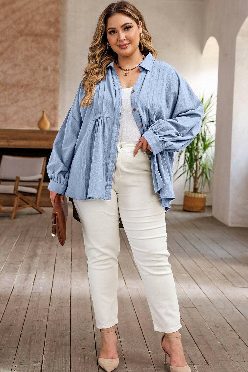 High-Low Cotton Button-Up Shirt for Curvy WomenHigh-Low Cotton Button-Up Shirt for Curvy Women
 Upgrade your wardrobe with the perfect blend of style and comfort in our High-Low Cotton Button-Up Shirt tailored foLove Salve High-Low Cotton Button-plus