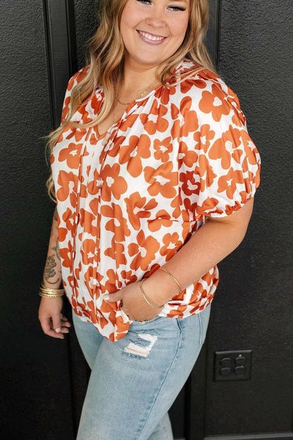 Printed Short Sleeve Tie Neck Blouse for Curvy WomenUpgrade Your Wardrobe with our Printed Short Sleeve Tie Neck Blouse!
 
 
Flattering Fit: Designed for curvy women, this blouse accentuates your curves in all the rigLove Salve Printed Short Sleeve Tie Neck Blouseplus