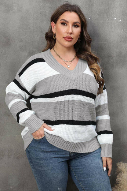 Cozy Striped V-Neck Oversized SweaterStay Stylish and Comfy with Our Cozy Striped V-Neck Oversized Sweater
 Upgrade your wardrobe with our Cozy Striped V-Neck Oversized Sweater, perfect for both lounginLove Salve -Neck Oversized Sweaterplus