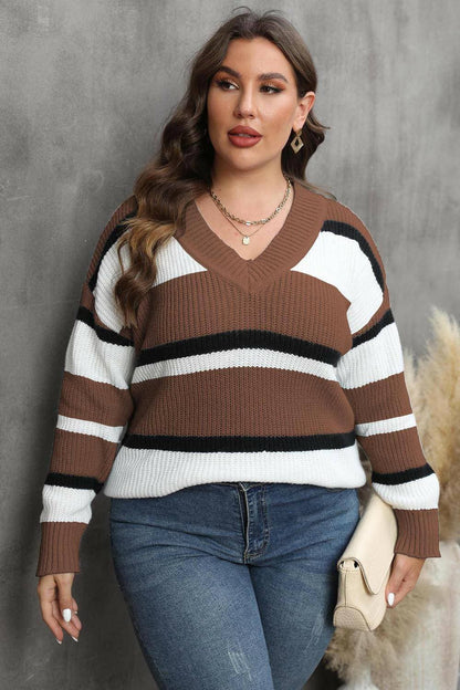 Cozy Striped V-Neck Oversized SweaterStay Stylish and Comfy with Our Cozy Striped V-Neck Oversized Sweater
 Upgrade your wardrobe with our Cozy Striped V-Neck Oversized Sweater, perfect for both lounginLove Salve -Neck Oversized Sweaterplus