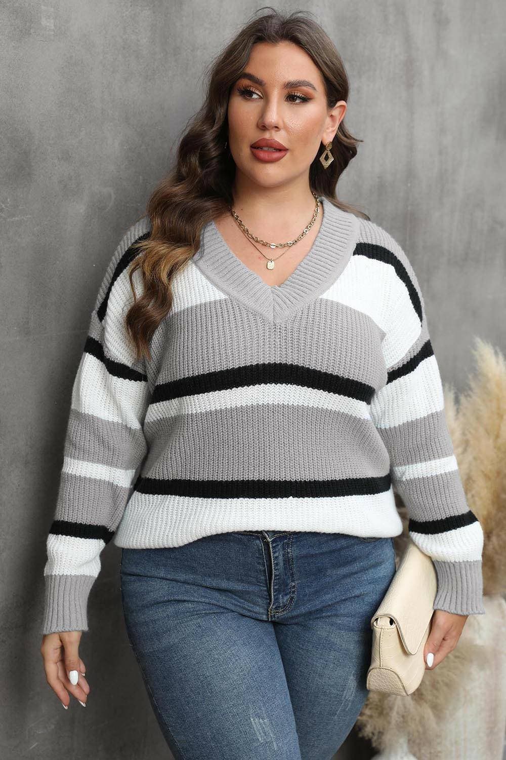 Cozy Striped V-Neck Oversized SweaterStay Stylish and Comfy with Our Cozy Striped V-Neck Oversized Sweater
 Upgrade your wardrobe with our Cozy Striped V-Neck Oversized Sweater, perfect for both lounginLove Salve -Neck Oversized Sweaterplus