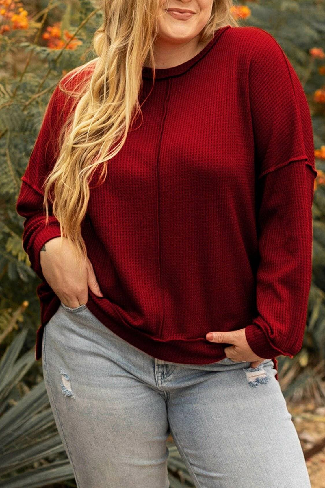 Curvy chic: Waffle-knit high-low sweatshirt with trendy exposed seams