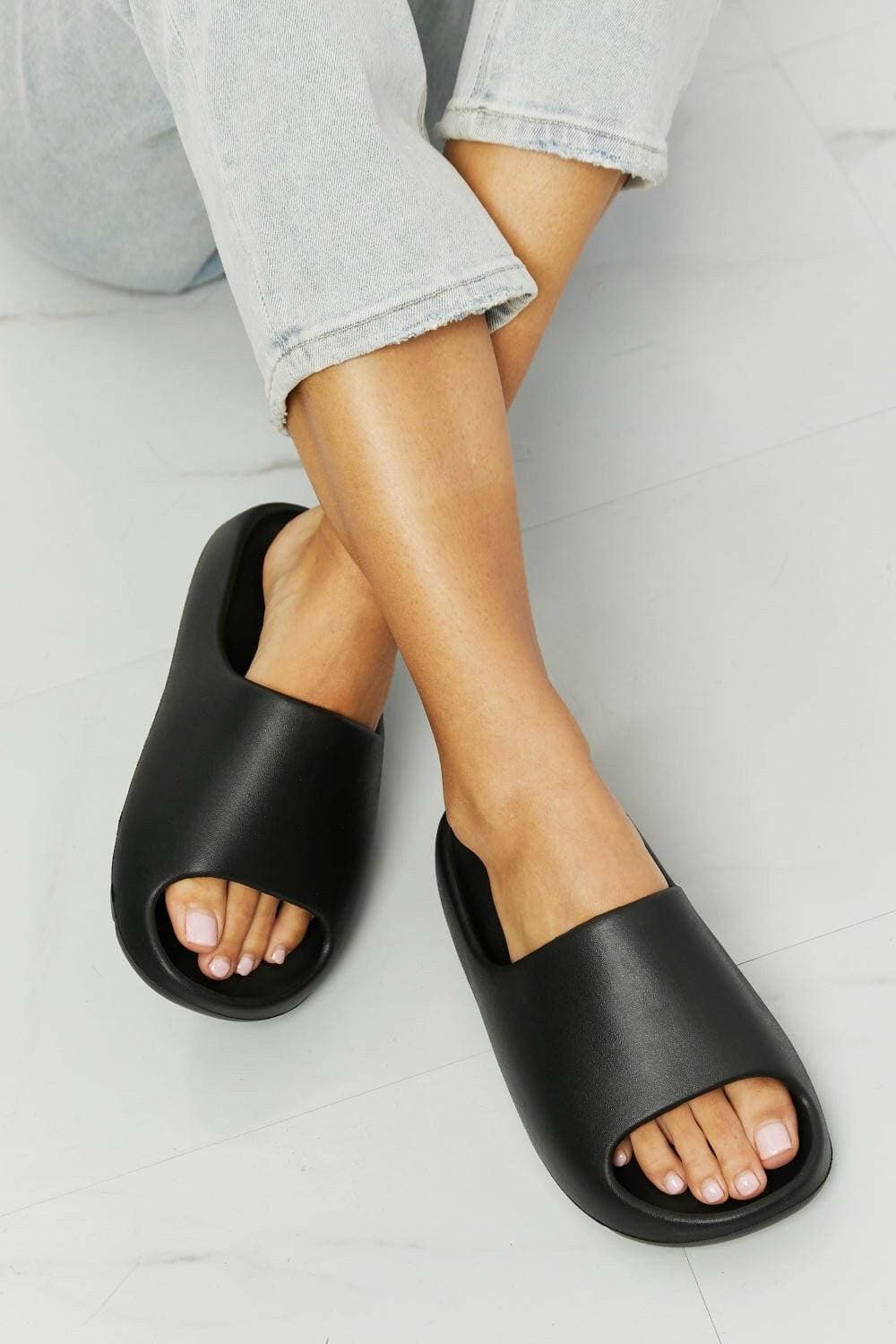 Step up your fashion game with the Black NOOK JOI Comfort SlidesStep Up Your Fashion Game with the Black NOOK JOI Comfort Slides
 Elevate your style effortlessly with the Black NOOK JOI Comfort Slides, where fashion meets functioLove Salve Black NOOK JOI Comfort SlidesShoes