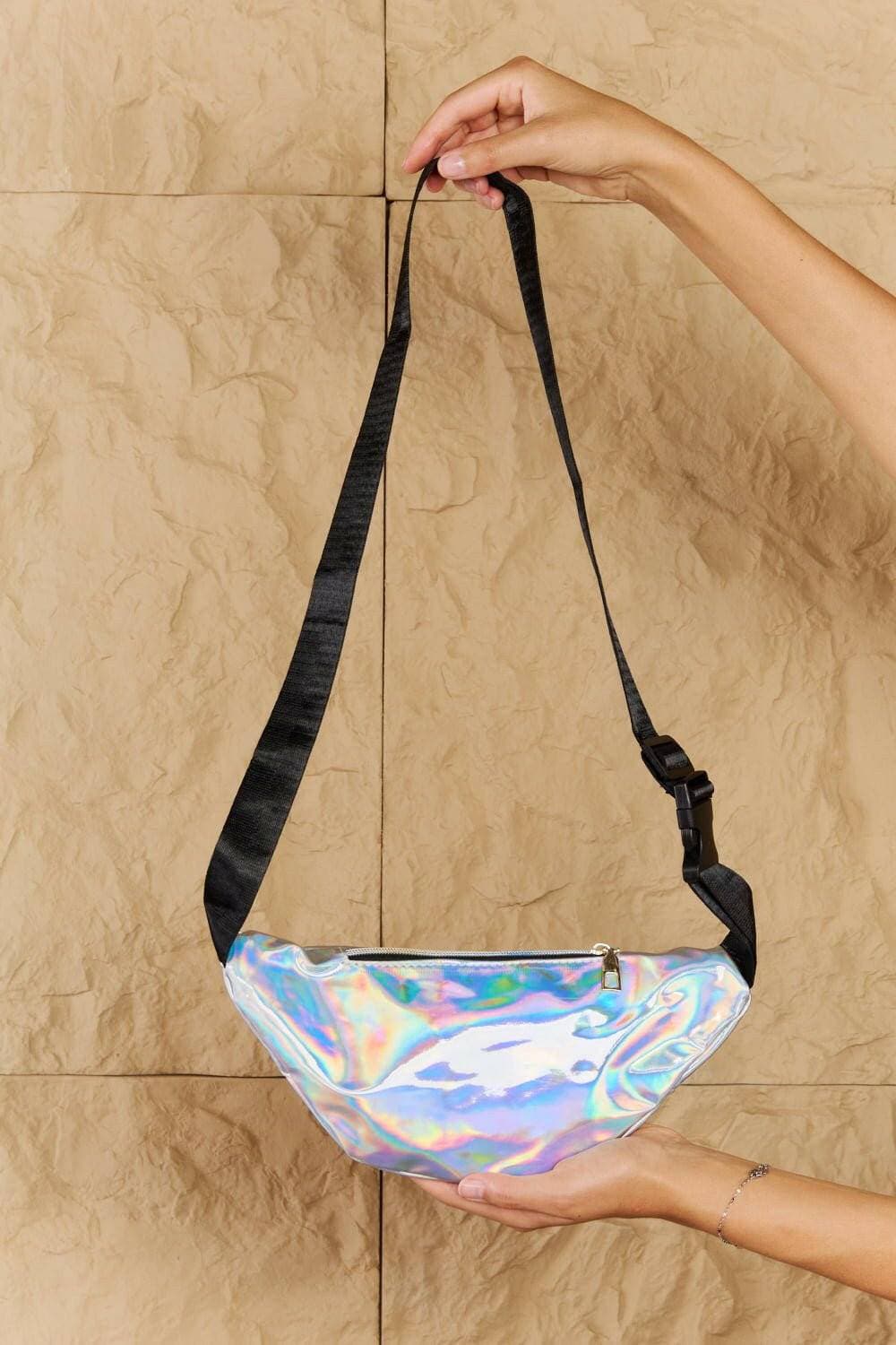 Shimmering silver holographic fanny pack with dual zippers