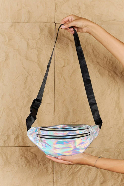 Shimmering silver holographic fanny pack with dual zippers