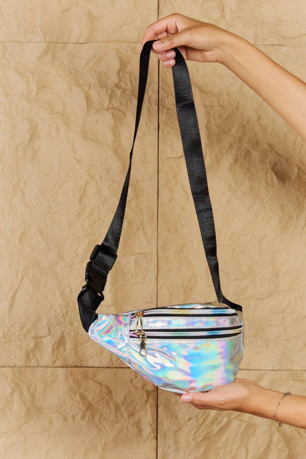 Shimmering silver holographic fanny pack with dual zippers