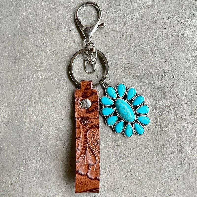 Turquoise Leather Keychain with Alloy and Iron AccentsStand out with Style
 
 
Mix of Materials: Crafted with a unique blend of alloy, iron, and genuine leather, this keychain is a standout accessory.
 
Turquoise AccentLove Salve Turquoise Leather KeychainShoes