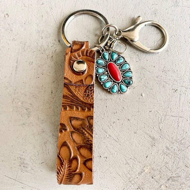 Turquoise Leather Keychain with Alloy and Iron AccentsStand out with Style
 
 
Mix of Materials: Crafted with a unique blend of alloy, iron, and genuine leather, this keychain is a standout accessory.
 
Turquoise AccentLove Salve Turquoise Leather KeychainShoes