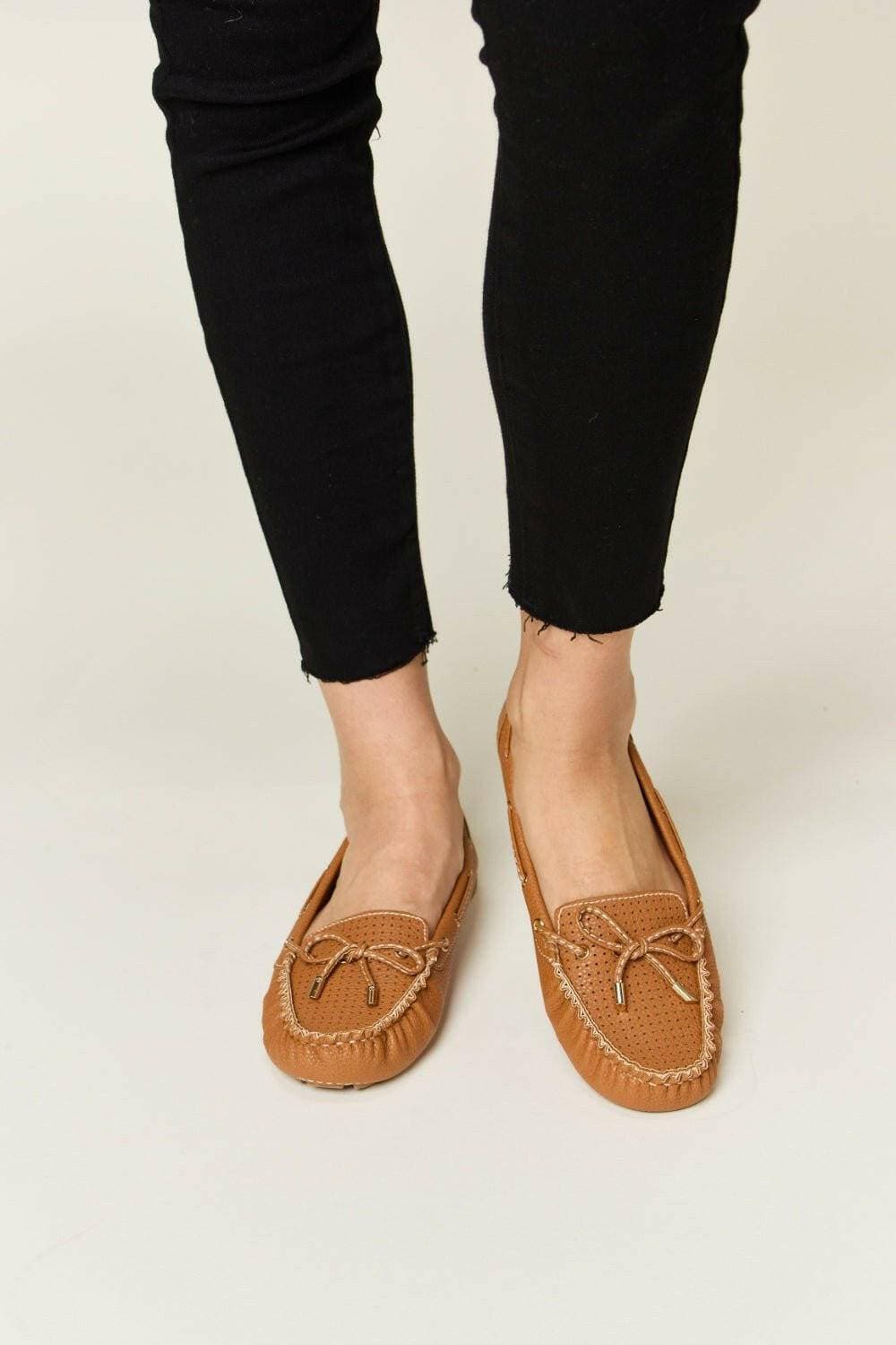 Elegant Bow Embellished Flat Loafers in Faux LeatherStep into Elegance
 Enhance your outfit effortlessly with these Elegant Bow Embellished Flat Loafers in high-quality faux leather. Designed to provide a sophisticateLove Salve Elegant Bow Embellished Flat LoafersShoes