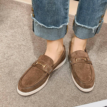 Suede Slip-On Flats with Metal BuckleSuede Slip-On Flats with Metal Buckle
 Indulge in chic sophistication with our Suede Slip-On Flats adorned with a classy Metal Buckle. Elevate your everyday look witLove Salve Suede Slip-Shoes