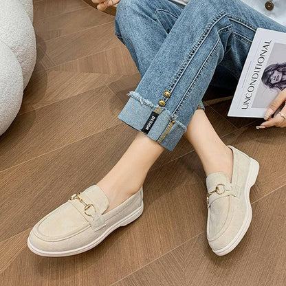 Suede Slip-On Flats with Metal BuckleSuede Slip-On Flats with Metal Buckle
 Indulge in chic sophistication with our Suede Slip-On Flats adorned with a classy Metal Buckle. Elevate your everyday look witLove Salve Suede Slip-Shoes