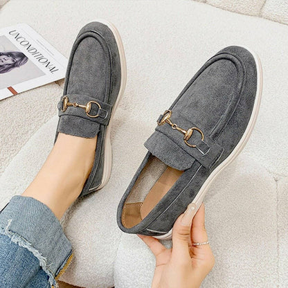 Suede Slip-On Flats with Metal BuckleSuede Slip-On Flats with Metal Buckle
 Indulge in chic sophistication with our Suede Slip-On Flats adorned with a classy Metal Buckle. Elevate your everyday look witLove Salve Suede Slip-Shoes