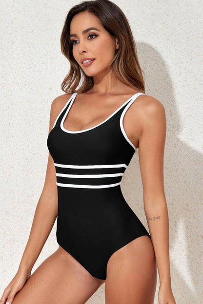 Chic Contrast Trim One-Piece Swimsuit with Scoop NeckChic Contrast Trim One-Piece Swimsuit with Scoop Neck
 
 
Stand Out in Style: Make a fashion statement with our chic one-piece swimsuit featuring a trendy contrast tLove Salve Chic Contrast Trimswimwear