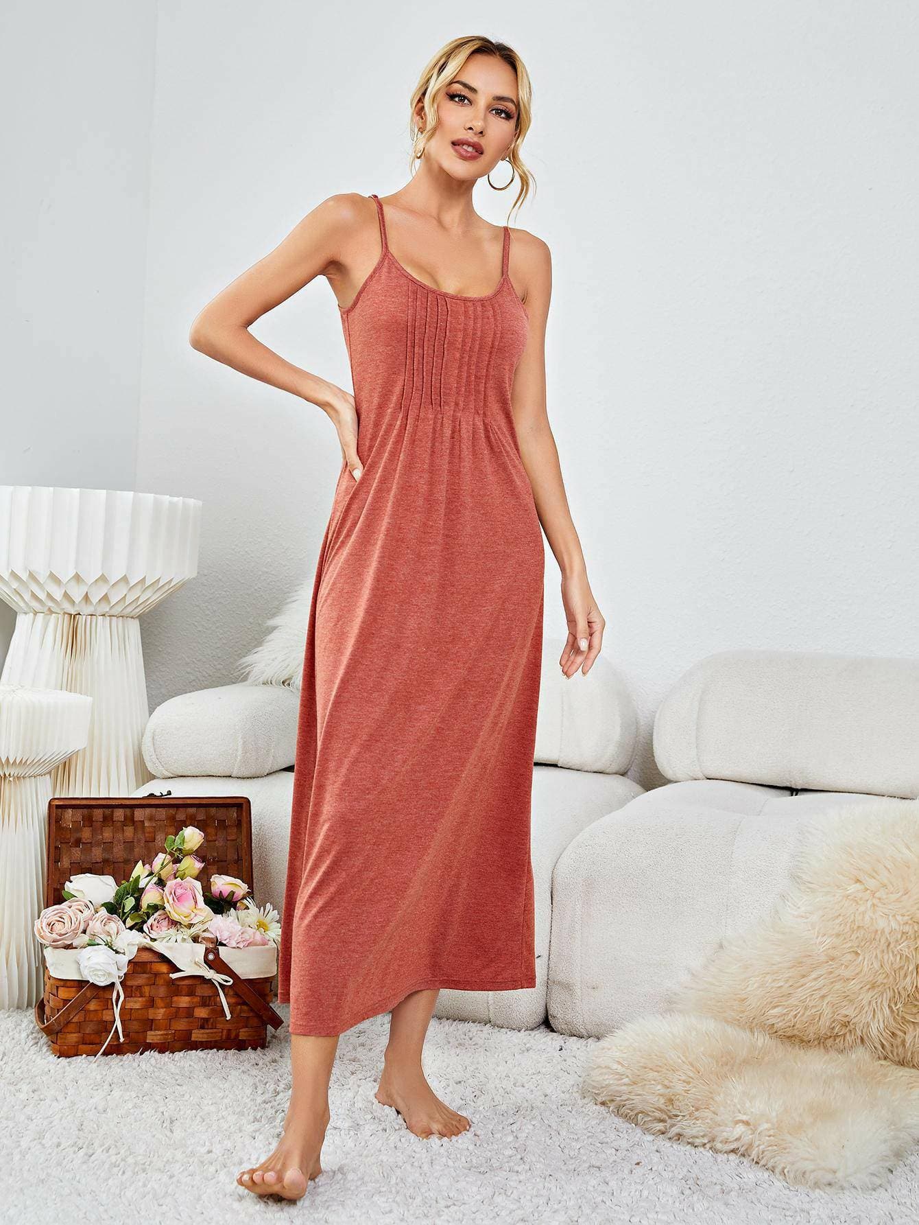 Elegant Sleeveless Nightgown with Scoop NeckElegant Sleeveless Nightgown with Scoop Neck
 
 
Material: Crafted from a luxurious blend of 75% polyester, 20% cotton, and 5% elastane
 
Style: Embrace a minimalistLove Salve Elegant Sleeveless Nightgownswimwear