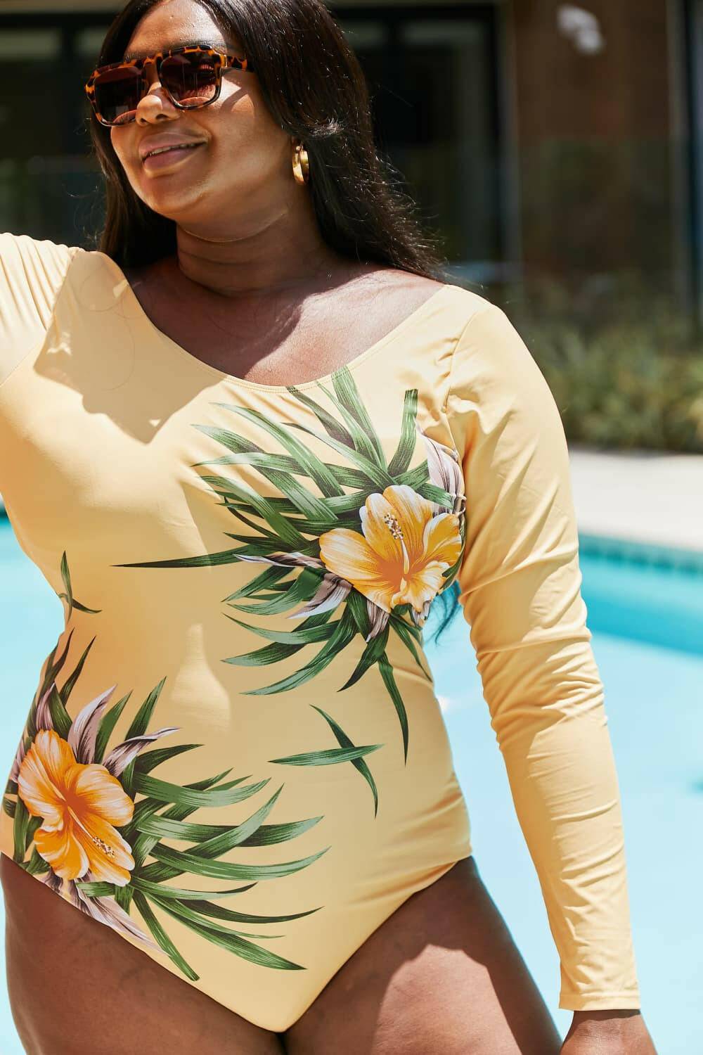 Sun-Kissed Blooms Longsleeve Sun-Blocking SwimsuitUnveil Your Summer Style with the Sun-Kissed Blooms Longsleeve Sun-Blocking Swimsuit
 Step into a world of vibrant elegance with our Sun-Kissed Blooms Longsleeve SunLove Salve Sun-Kissed Blooms Longsleeve Sun-Blocking Swimsuitswimwear