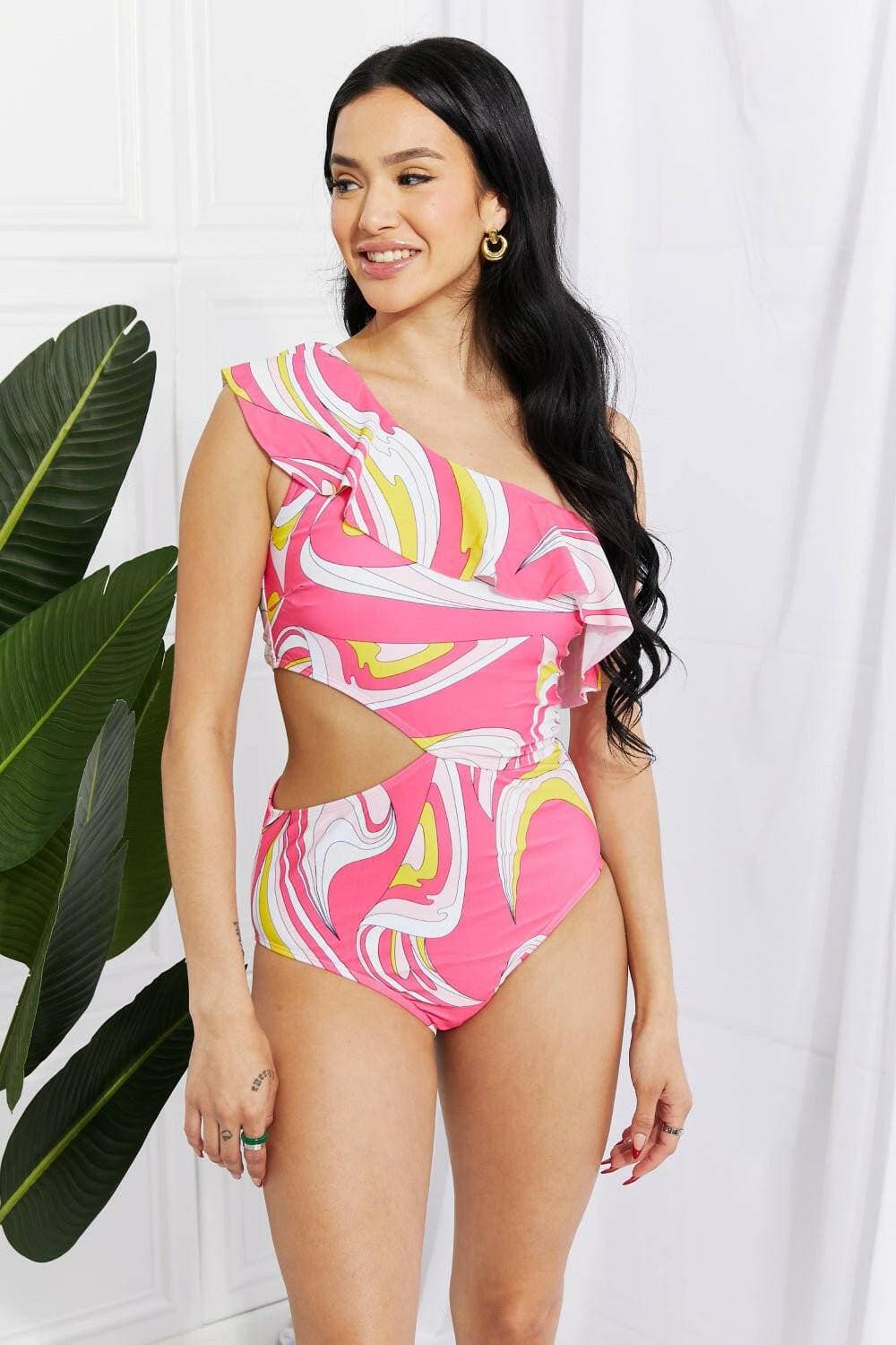 Paradise Pink One Shoulder Swimsuit with Ruffle Detail by Marina West Introducing the Paradise Pink One Shoulder Swimsuit with Ruffle Detail
 Elevate your swimwear collection with the Paradise Pink One Shoulder Swimsuit by Marina West Love Salve Marina West Swimswimwear