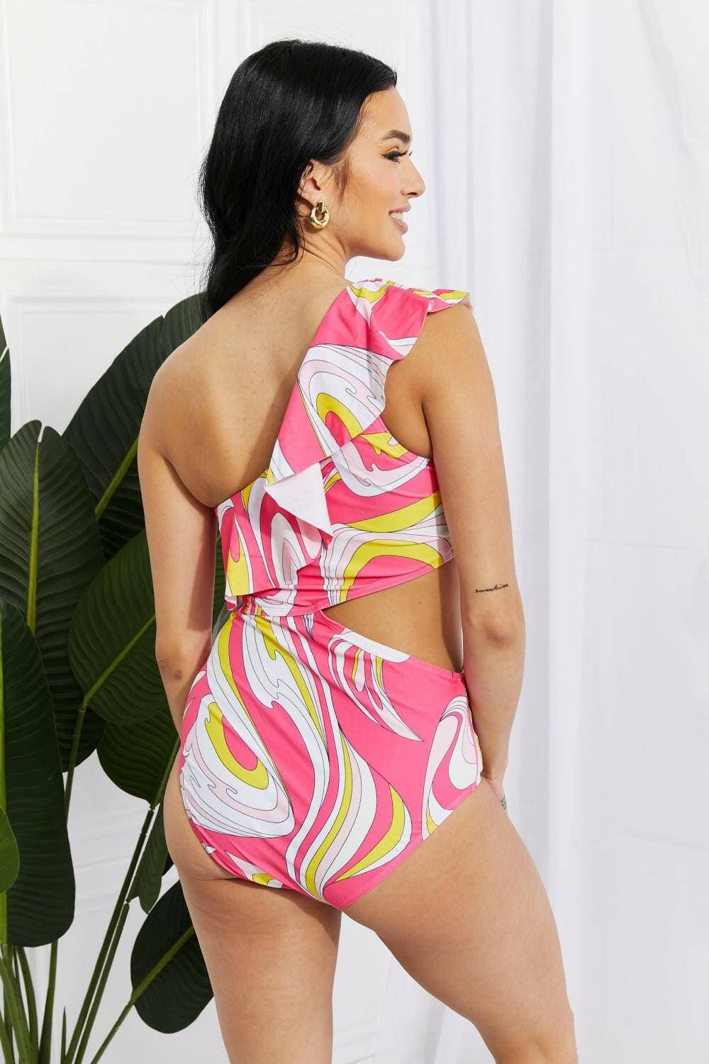 Paradise Pink One Shoulder Swimsuit with Ruffle Detail by Marina West Introducing the Paradise Pink One Shoulder Swimsuit with Ruffle Detail
 Elevate your swimwear collection with the Paradise Pink One Shoulder Swimsuit by Marina West Love Salve Marina West Swimswimwear