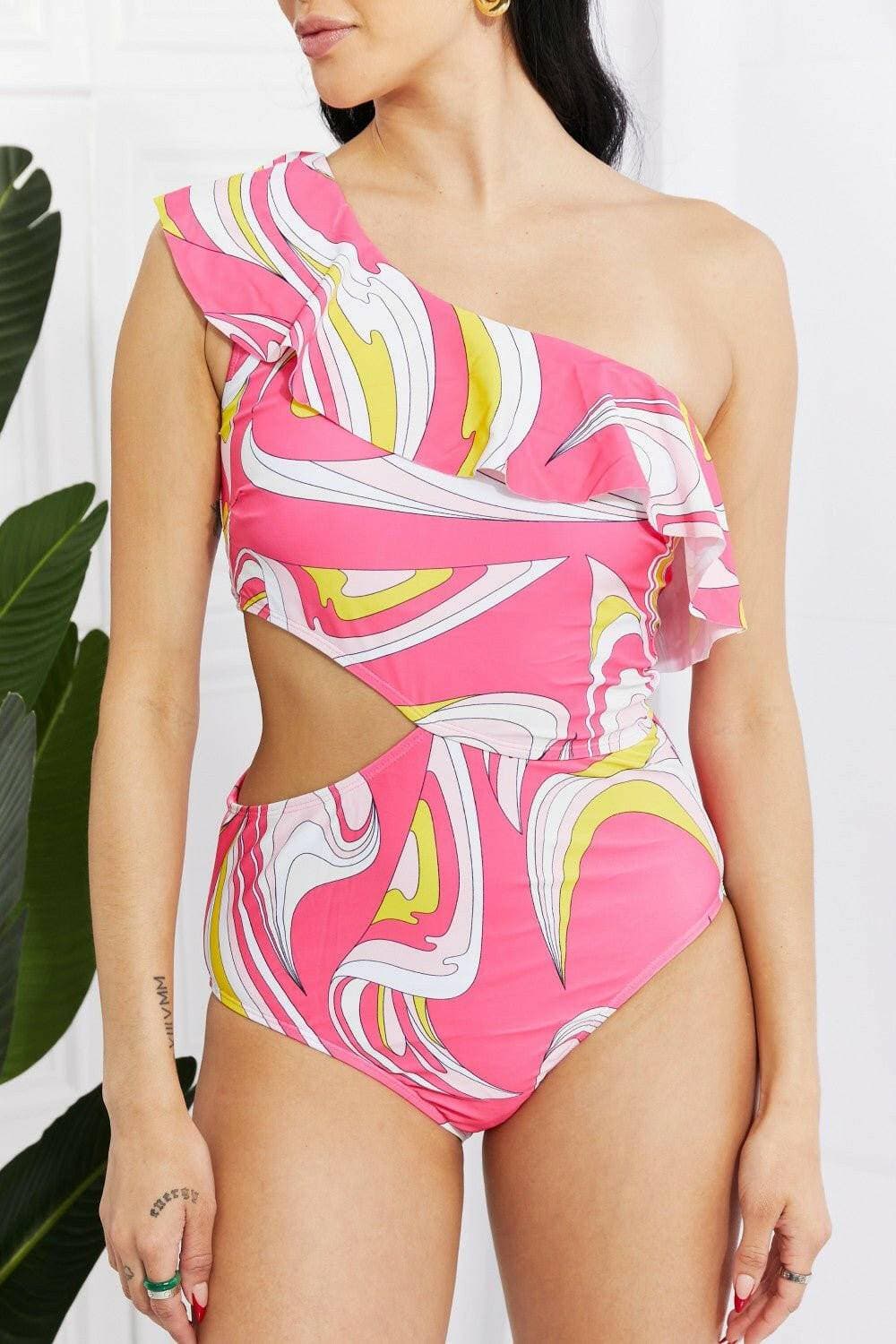 Paradise Pink One Shoulder Swimsuit with Ruffle Detail by Marina West Introducing the Paradise Pink One Shoulder Swimsuit with Ruffle Detail
 Elevate your swimwear collection with the Paradise Pink One Shoulder Swimsuit by Marina West Love Salve Marina West Swimswimwear