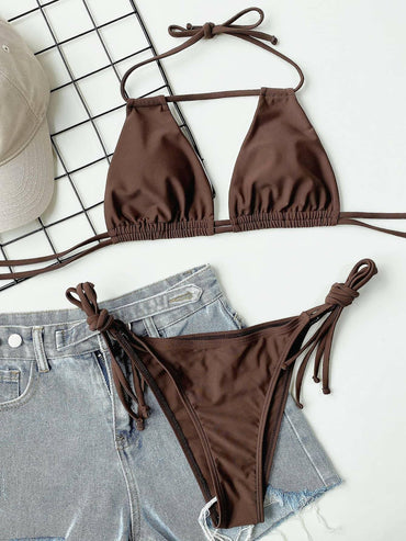 Ruched Halter Neck Bikini Set for a Tropical GetawayGet Ready for Fun in the Sun with Our Ruched Halter Neck Bikini Set!
 
 
Top Type: No underwire
 
Number of Pieces: Two
 
Chest Pad: Removable padding
 
Pattern TypeLove Salve Ruched Halter Neck Bikini Setswimwear