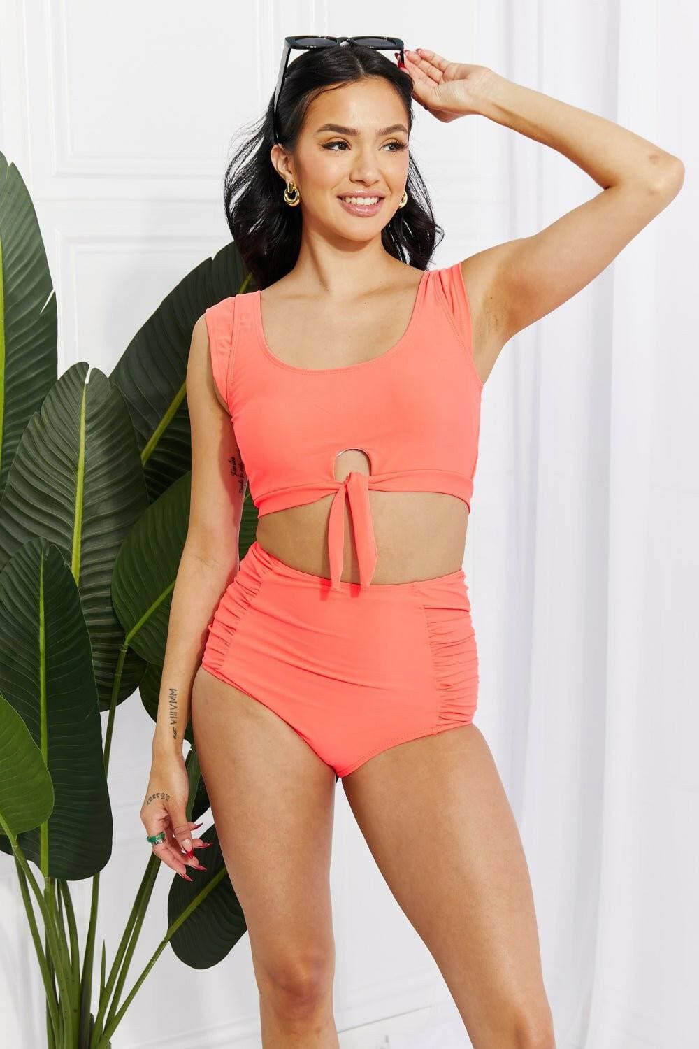 Coral Sanibel Crop Swimsuit Set with Ruched Bottoms by Marina West SwiCoral Sanibel Crop Swimsuit Set with Ruched Bottoms by Marina West Swim
 Discover the perfect blend of retro charm and contemporary style with the Coral Sanibel CropLove Salve Coral Sanibel Crop Swimsuit Setswimwear