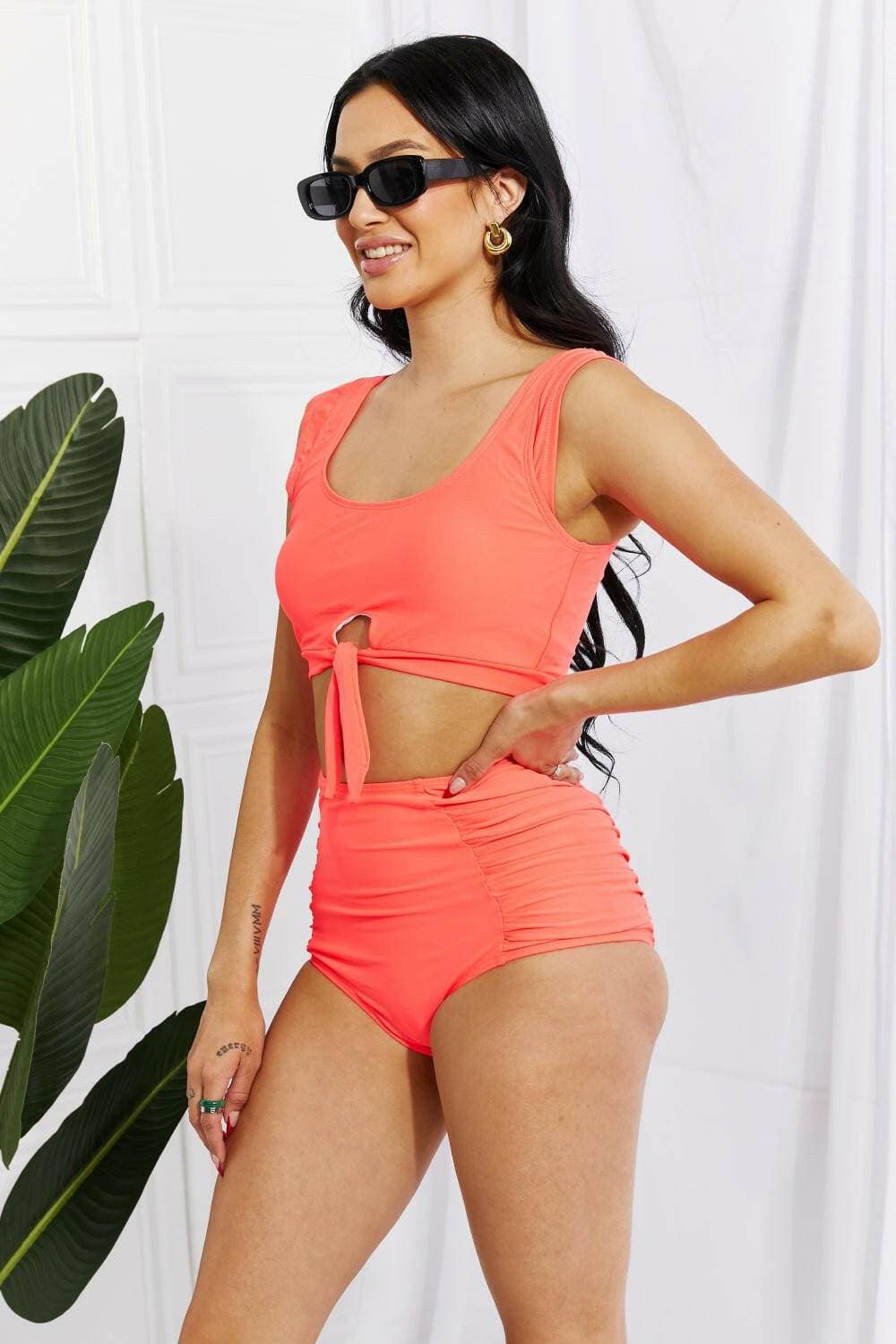 Coral Sanibel Crop Swimsuit Set with Ruched Bottoms by Marina West SwiCoral Sanibel Crop Swimsuit Set with Ruched Bottoms by Marina West Swim
 Discover the perfect blend of retro charm and contemporary style with the Coral Sanibel CropLove Salve Coral Sanibel Crop Swimsuit Setswimwear