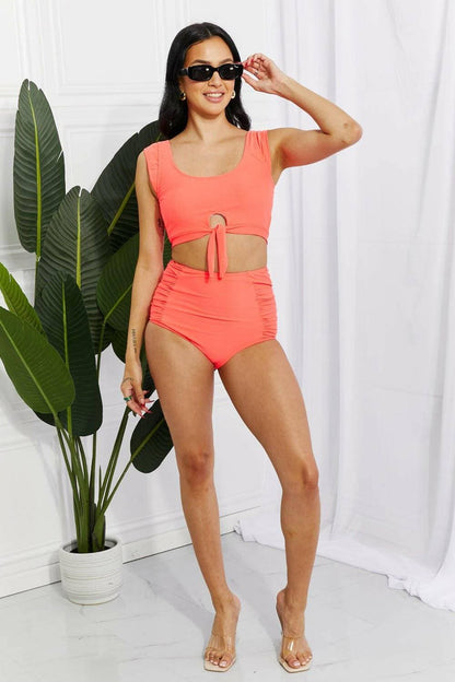 Coral Sanibel Crop Swimsuit Set with Ruched Bottoms by Marina West SwiCoral Sanibel Crop Swimsuit Set with Ruched Bottoms by Marina West Swim
 Discover the perfect blend of retro charm and contemporary style with the Coral Sanibel CropLove Salve Coral Sanibel Crop Swimsuit Setswimwear