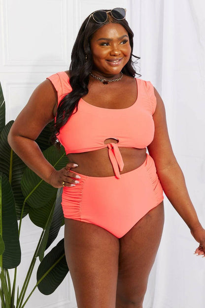 Coral Sanibel Crop Swimsuit Set with Ruched Bottoms by Marina West SwiCoral Sanibel Crop Swimsuit Set with Ruched Bottoms by Marina West Swim
 Discover the perfect blend of retro charm and contemporary style with the Coral Sanibel CropLove Salve Coral Sanibel Crop Swimsuit Setswimwear