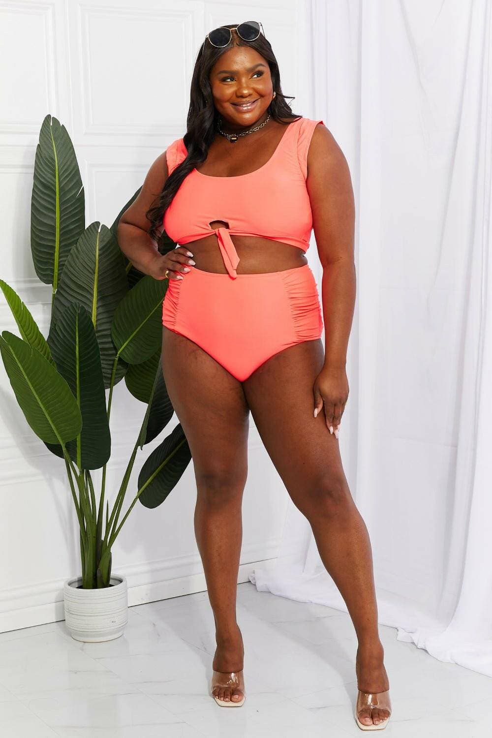 Coral Sanibel Crop Swimsuit Set with Ruched Bottoms by Marina West SwiCoral Sanibel Crop Swimsuit Set with Ruched Bottoms by Marina West Swim
 Discover the perfect blend of retro charm and contemporary style with the Coral Sanibel CropLove Salve Coral Sanibel Crop Swimsuit Setswimwear