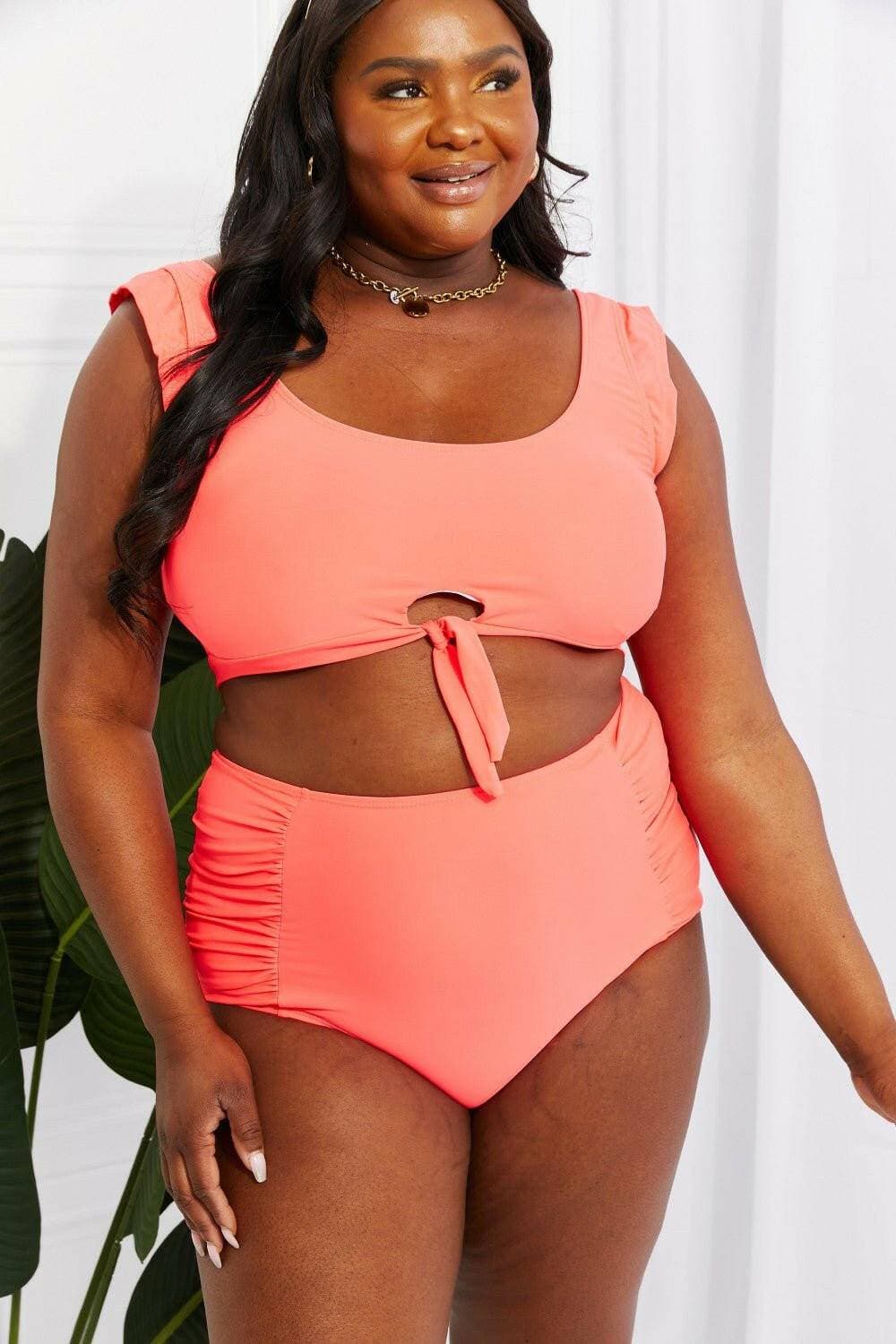 Coral Sanibel Crop Swimsuit Set with Ruched Bottoms by Marina West SwiCoral Sanibel Crop Swimsuit Set with Ruched Bottoms by Marina West Swim
 Discover the perfect blend of retro charm and contemporary style with the Coral Sanibel CropLove Salve Coral Sanibel Crop Swimsuit Setswimwear