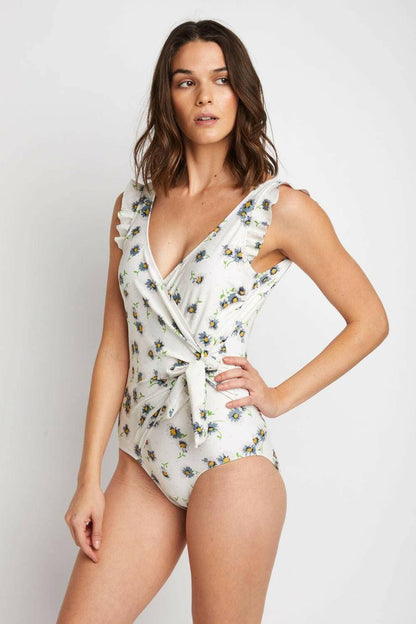 Chic daisy cream ruffle wrap swimsuit for a stylish summer