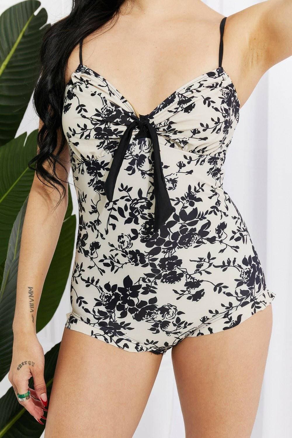 Azure Shores Toile Floral Ruffle Trim SwimsuitAzure Shores Toile Floral Ruffle Trim Swimsuit
 Step into a realm of vintage sophistication with the Azure Shores Toile Floral Ruffle Trim Swimsuit. This exquisite oLove Salve Azure Shores Toile Floral Ruffle Trim Swimsuitswimwear