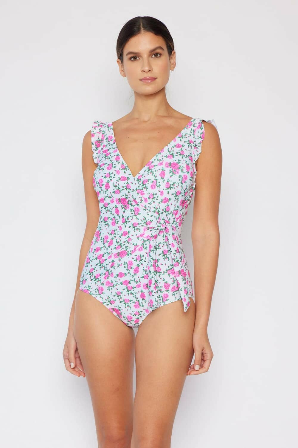 Roses Off-White Ruffle One-Piece Swimsuit with Wrap Detail by Marina WExperience Elegance with the Roses Off-White Ruffle One-Piece Swimsuit
 Step into a world of sophistication and style with the stunning Roses Off-White Ruffle Faux WLove Salve Marina West Swimswimwear