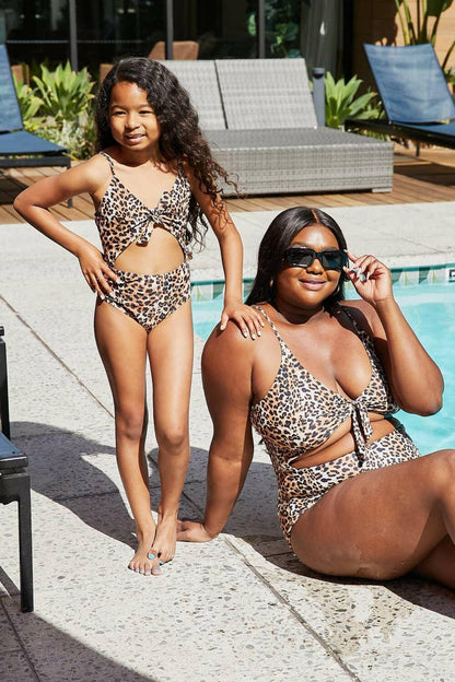 Leopard Cutout One-Piece Swimsuit for the Fearless FashionistaUnleash Your Fearless Style
 Step into the spotlight and showcase your bold fashion sense with the Leopard Cutout One-Piece Swimsuit, specially crafted for the darinLove Salve Leopard Cutoutswimwear