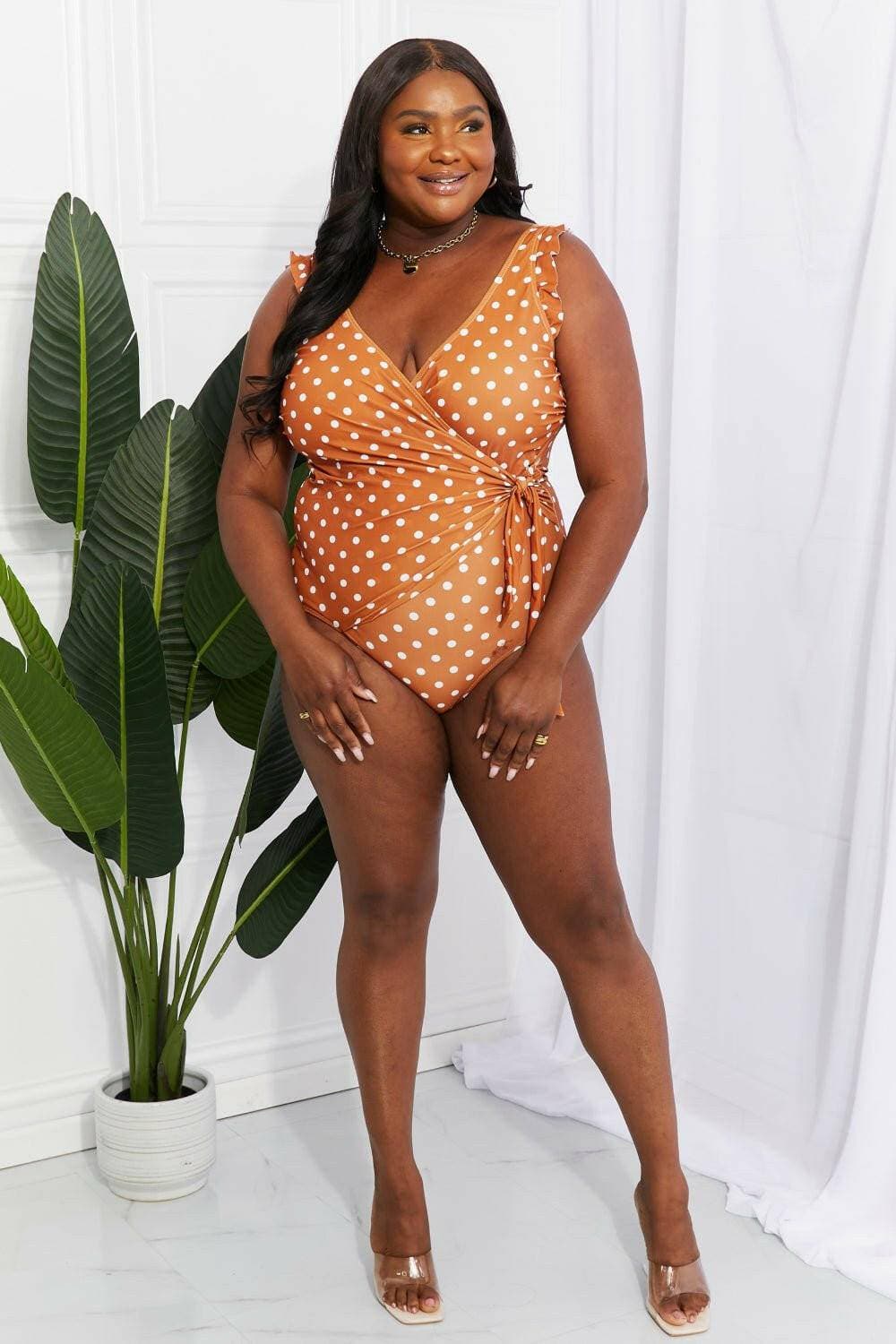 Ruffle Wrap Terracotta Swimsuit with Flirty FrillsUnleash Your Inner Mermaid with the Ruffle Wrap Terracotta Swimsuit
 Step into summer with confidence and charm in our Ruffle Wrap Terracotta Swimsuit. Designed for Love Salve Ruffle Wrap Terracotta Swimsuitswimwear