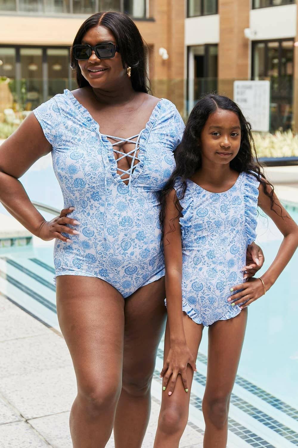 Enchanted Blooms Lace-Up One Piece Swimsuit in Twilight TealUnleash Your Seaside Allure
 Experience the perfect blend of style and comfort with the Enchanted Blooms Lace-Up One Piece Swimsuit in Twilight Teal. This stunning sLove Salve Enchanted Blooms Lace-swimwear