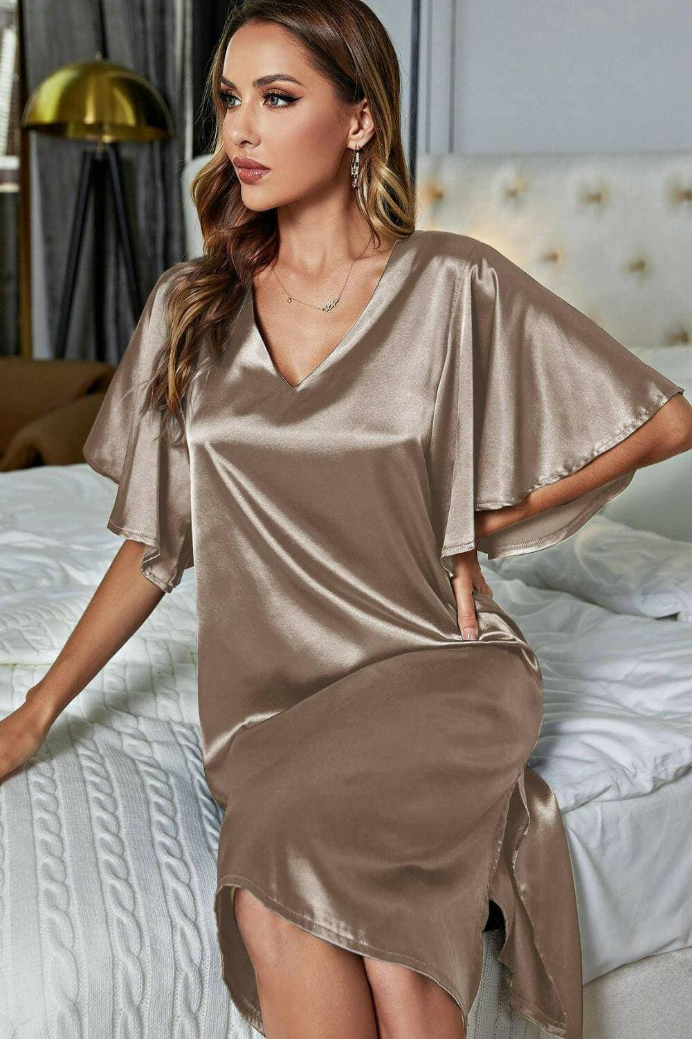 Elegant Satin V-Neck Night Dress with Flutter SleevesElegant Satin V-Neck Night Dress with Flutter Sleeves
 Indulge in pure luxury with our Elegant Satin V-Neck Night Dress, designed to elevate your nighttime routine wLove Salve -Neck Night Dressswimwear