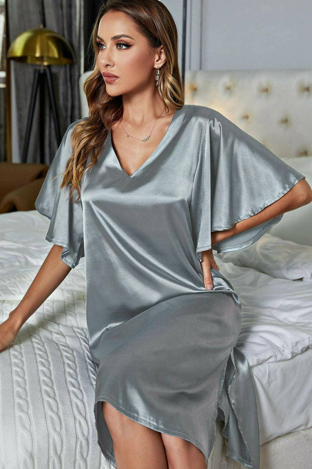 Elegant Satin V-Neck Night Dress with Flutter SleevesElegant Satin V-Neck Night Dress with Flutter Sleeves
 Indulge in pure luxury with our Elegant Satin V-Neck Night Dress, designed to elevate your nighttime routine wLove Salve -Neck Night Dressswimwear