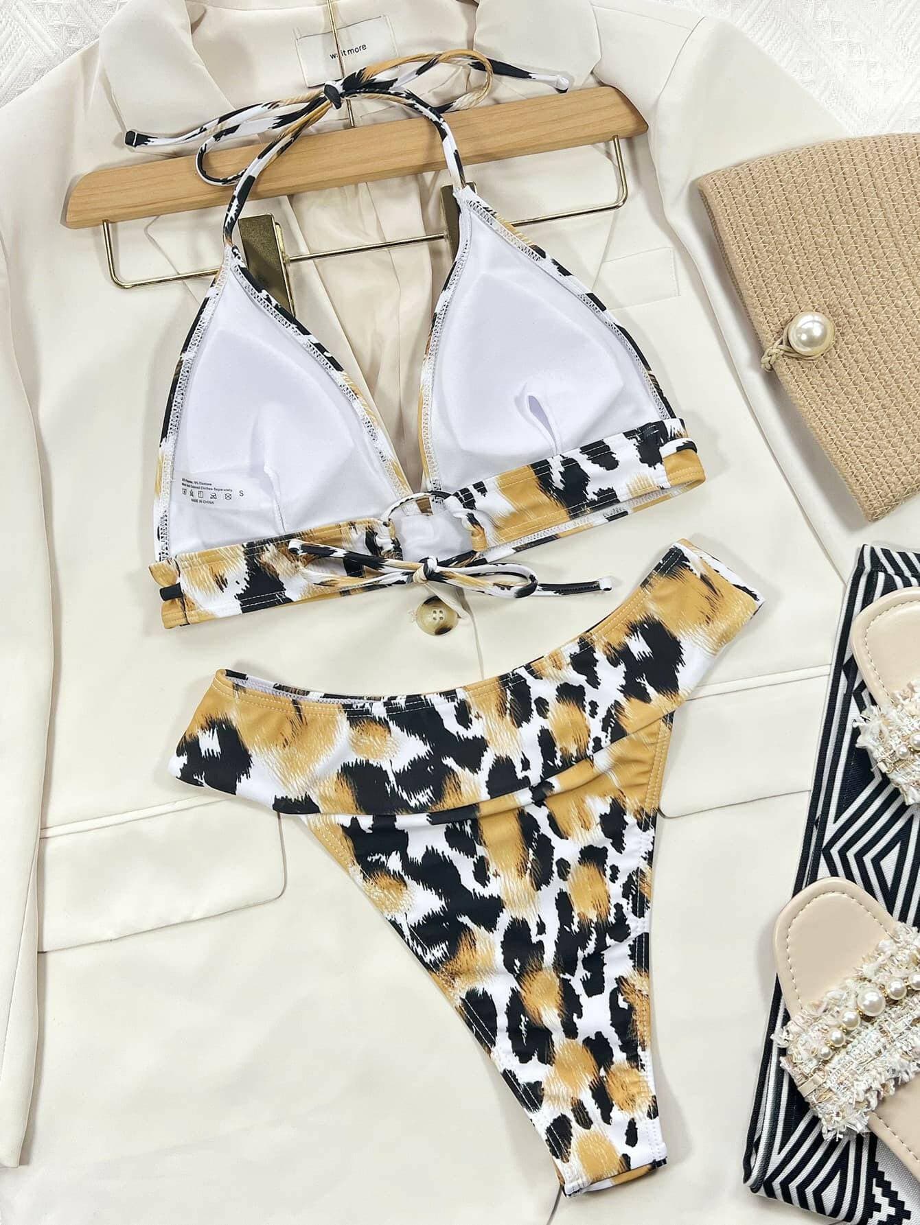 Wild Safari Halter Bikini SetUpgrade Your Beach Style with the Wild Safari Halter Bikini Set!
 
 
 
Stylish Design: Stand out in the crowd with the eye-catching animal print design.
 
CustomizabLove Salve Wild Safari Halter Bikini Setswimwear