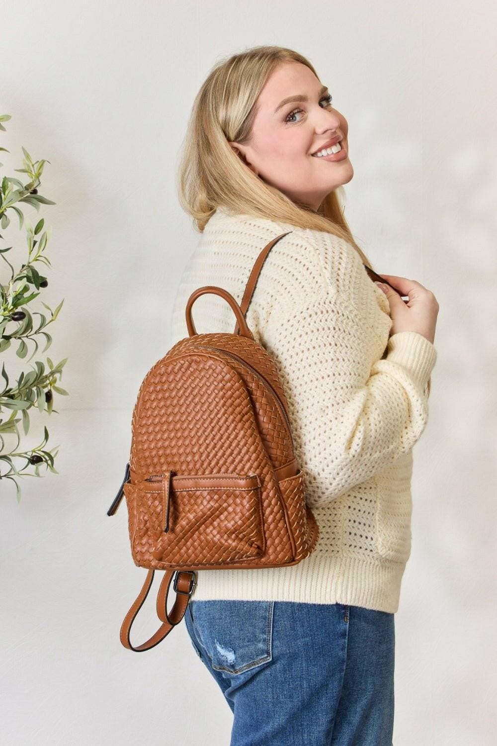 Elegant Woven PU Leather Backpack - Exquisite Design and Premium QualiExperience Luxury and Style
 Discover the perfect blend of elegance and functionality with our Elegant Woven PU Leather Backpack. This exquisite accessory is designeLove Salve Elegant Woven PU Leather Backpack - Exquisite DesignTIKTOK