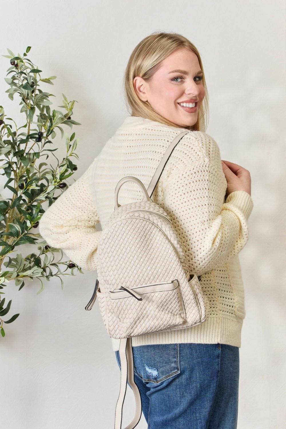 Elegant Woven PU Leather Backpack - Exquisite Design and Premium QualiExperience Luxury and Style
 Discover the perfect blend of elegance and functionality with our Elegant Woven PU Leather Backpack. This exquisite accessory is designeLove Salve Elegant Woven PU Leather Backpack - Exquisite DesignTIKTOK